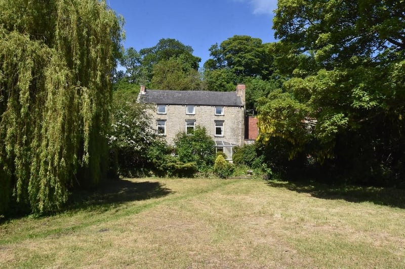 The outdoor space extends to approximately 13 acres and this includes a stretch of open grassland running adjacent to the river and broadly divided into two fields.