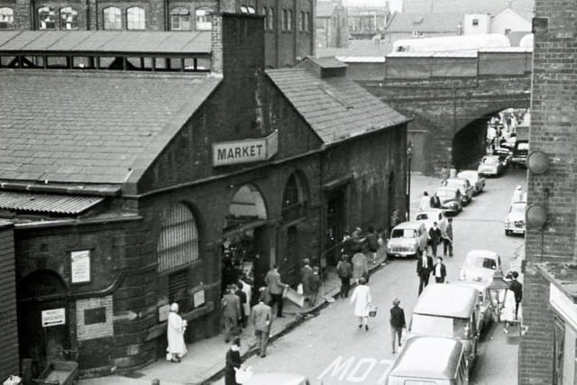 A view of Shude Hill, Sheffield, in July 1965, with the old fish market on the left
