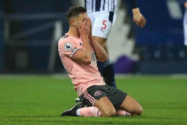 Sheffield United's George Baldock after missing a gilt-edged opportunity against West Brom at the Hawthorns tonight. (Photo by Lindsey Parnaby - Pool/Getty Images)