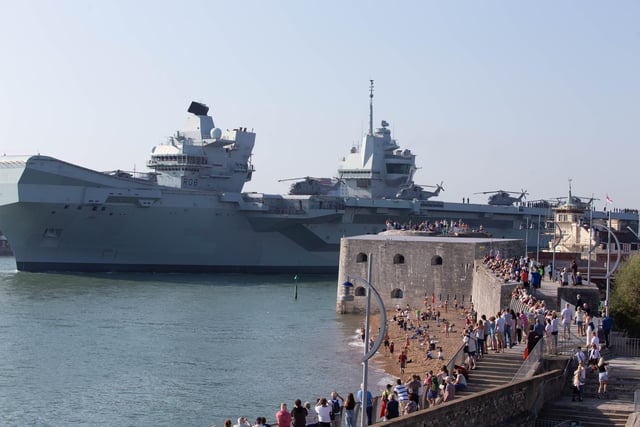 Crowds lined Old Portsmouth as HMS Queen Elizabeth departs. Picture: Habibur Rahman