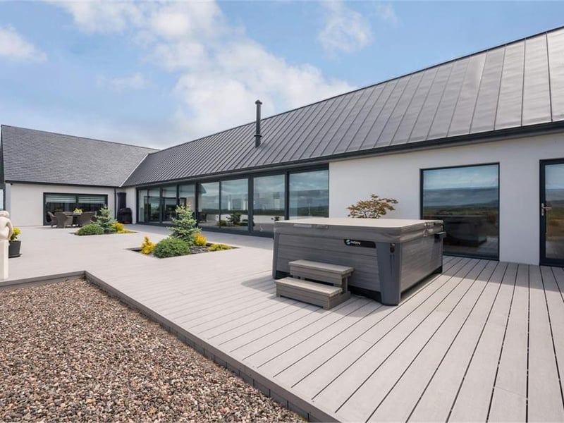 Decking area with hot tub.