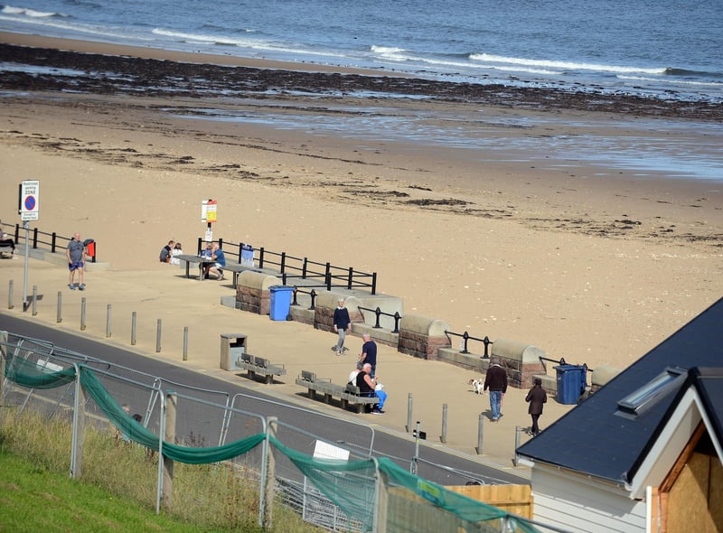 People are out and about enjoying the sunshine in Roker.