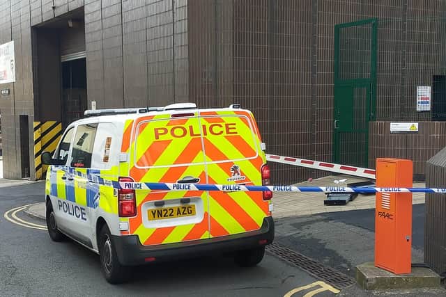 Orchard Lane, to the rear of Leopold Square, was cordoned off by police earlier today