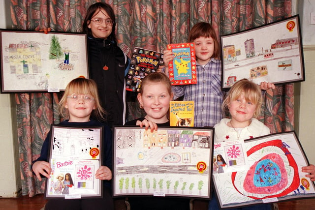 Pupils from Highfields Primary School who won a picture competition to draw their vision of how they would like to see Highfields redeveloped after Doncaster council announced plans for a £400,000 scheme for the area. The pupils are, left to right, back row, Vikki Williams 11 and Cathy Tingle eight. Front row Katie James, six, Amy Joynes, 10 and Terilea Denman, five