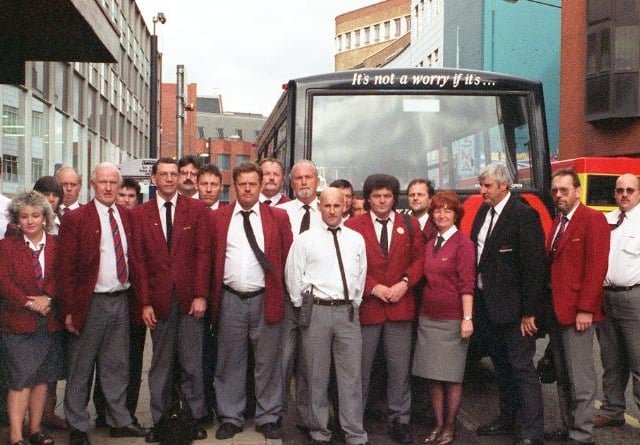 Bus drivers get together in 1997 to take a minutes silence.