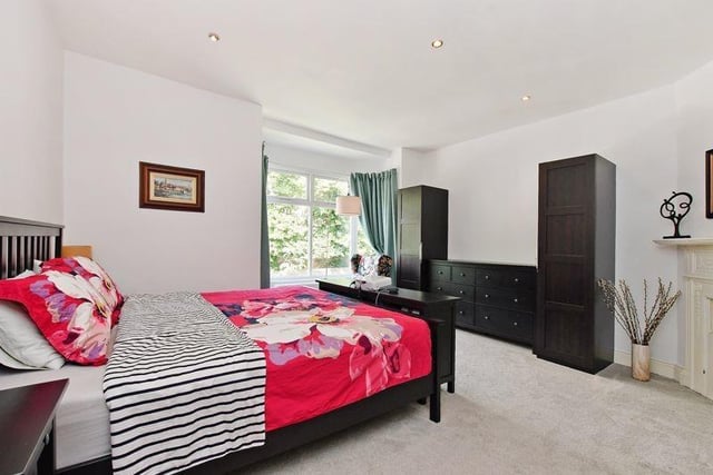 The master bedroom is incredibly spacious, with plenty of room for additional furniture if needed. It's also situated just opposite the family bathroom across the hall.