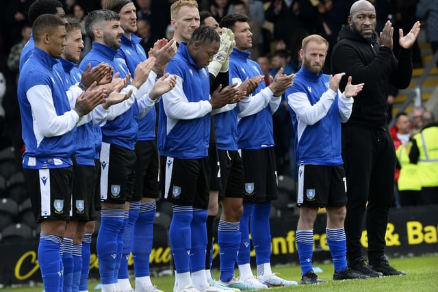 Owls boss Darren Moore lines up with his players before kick off for a minutes applause in memory of those that lost their lives in the Hillsborough disaster  Pic Steve Ellis
