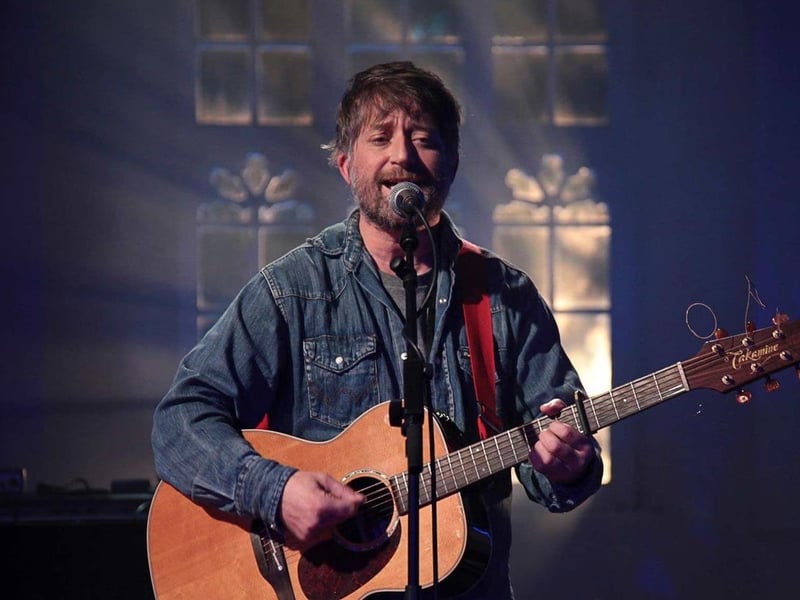 Experience the intimate beauty of King Creosote's folk music, where poetic lyrics and gentle melodies create a captivating atmosphere.
