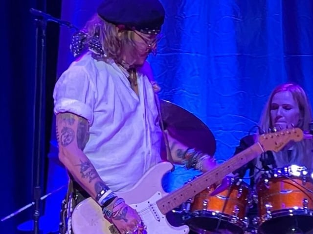 Johnny Depp on stage at Sheffield City Hall. Picture: Jay Wang