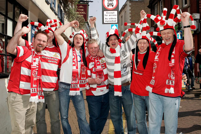 Doncaster Rovers supporters outside the Millennium Stadium in Cardiff ahead of the Johnstone's Paint Trophy final.