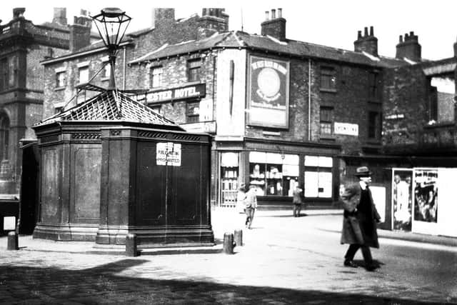 A view of Barker's Pool, Sheffield.  The structure on the left is a gent's urinal.  The war memorial is now on this site. Far left is the waterworks building.  The ruin on the far right is the site of the City Hall.