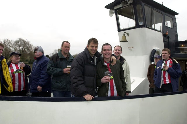 Blades fans at Putney Pier after their booze cruise down the Thames in April 2000. Ex-Bades hero Bob Booker and cruise organiser Andy Bonell, centre