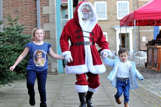 Charlotte McAleer (8) and Joel Newcombe (3) skipping with delight after their visit to Santa's Grotto at the Festival of Christmas held at the National Museum Royal Navy 4 years ago.