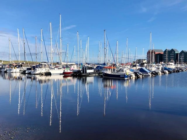 The sun shines at Amble Marina.