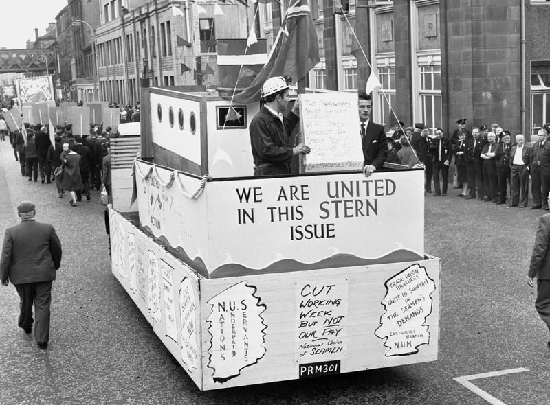 Some of the marching miners in 1966 are pictured on a NUM float from Easthouses. They were showing their solidarity with the National Union of Seamen who were looking to cut the number of hours in the working week.