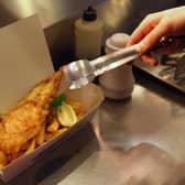 Sheffield's 'perfect' fish and chips meal has been revealed - and it includes scraps. File photo by Oli Scarff/Getty Images