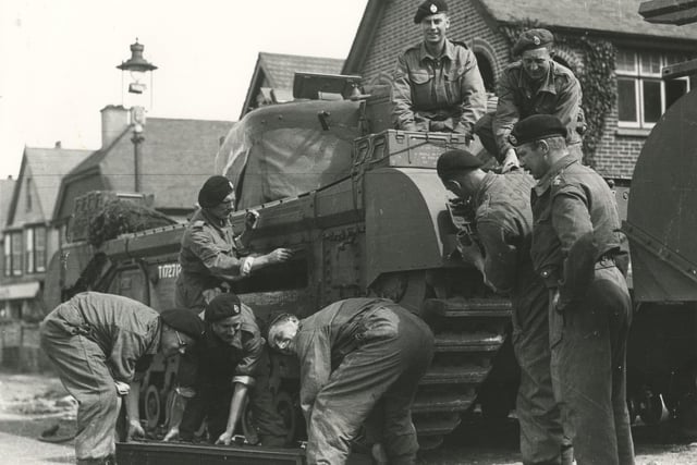 Churchill  tank crews prepare to embark
(c) The News, War Series 2873