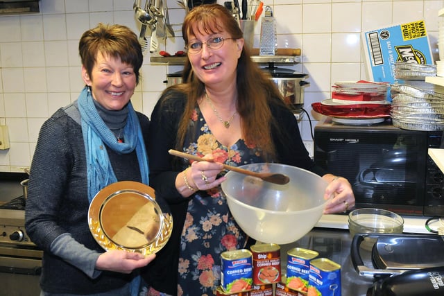 Gill Murray was the winner of a corned beef pie-making competition in 2012 and here she is with her trophy, standing next to the landlady of The Causeway Thema Adams a few months later.