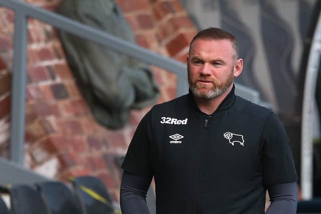 Wayne Rooney knows that not capitalising on Sheffield Wednesday's defeat could cost them.  (Photo by Alex Livesey/Getty Images)