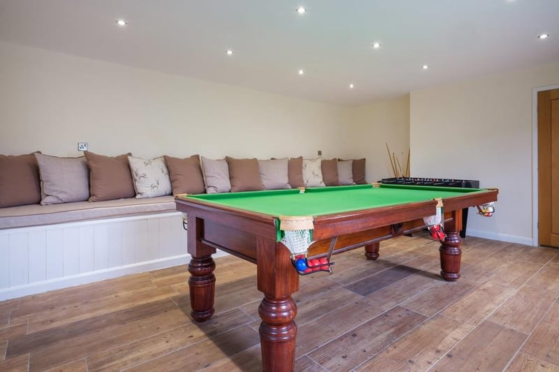 The games room - which can be turned into a fifth bedroom - lends itself to enough space for snooker and table football.
