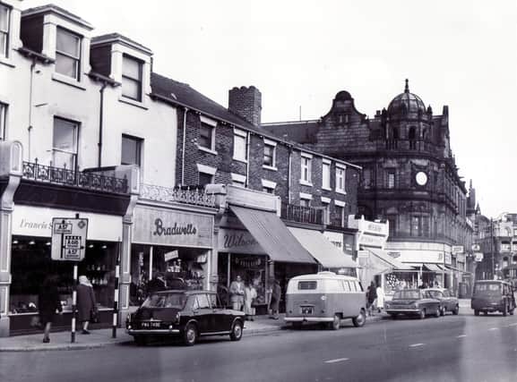 Shops on West Street, Sheffield, in 1967, including Bradwells, Francis Sinclair, Wilsons, Shaws and Boots Chemist