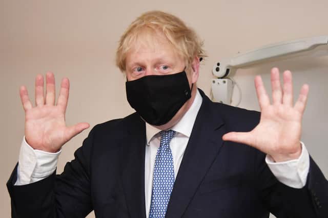 Prime minister Boris Johnson wears a face mask (Photo by Jeremy Selwyn - WPA Pool/Getty Images)