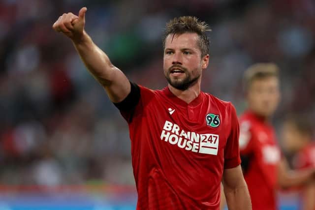 HANOVER, GERMANY - JULY 23: Julian Börner of Hannover 96 gestures during the Second Bundesliga match between Hannover 96 and FC St. Pauli at Heinz von Heiden Arena on July 23, 2022 in Hanover, Germany. (Photo by Martin Rose/Getty Images)