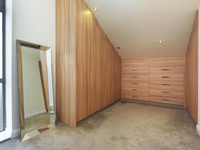 The master bedroom also has a walk in wardrobe attached.