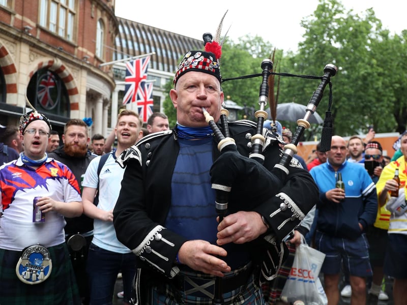 A bagpipe player as Scotland fans gather in Leicester Square before the UEFA Euro 2020 match between England and Scotland later tonight (Photo: Kieran Cleeves/PA Wire).