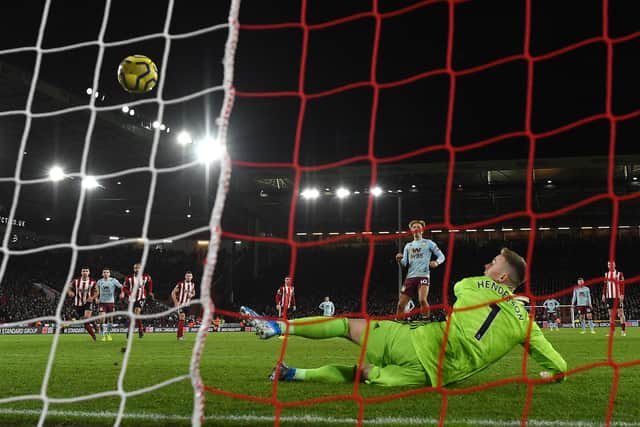 Aston Villa's Jack Grealish fails to score from the penalty spot during the Premier League match between Sheffield United and Aston Villa at Bramall Lane on December 14, 2019 in Sheffield, United Kingdom. (Photo by Shaun Botterill/Getty Images)