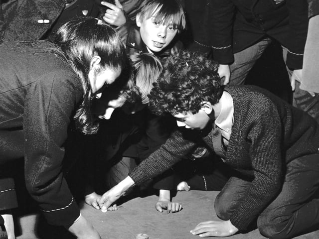 Pupils at Graeme High School in Callendar Road Falkirk take part in a Tiddlywinks championship in March 1970.