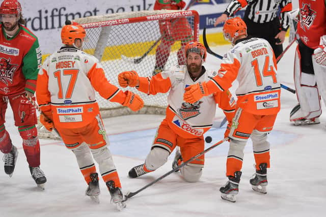 John Armstrong celebrates a goal at Cardiff Devils