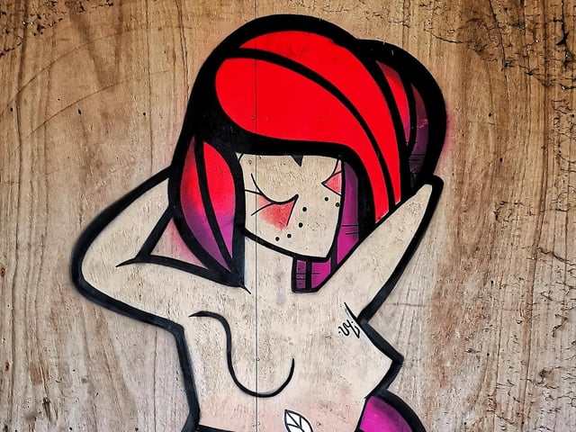 Artwork inside the building by artist Coloquix.