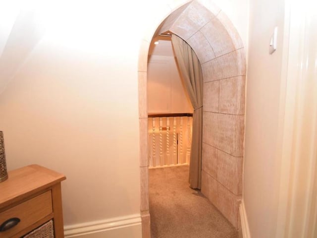 So typical of the charming character features at the property is this Gothic-style stone archway that leads to the accommodation on the second floor. Walk through here and you are truly the king or queen of the castle!