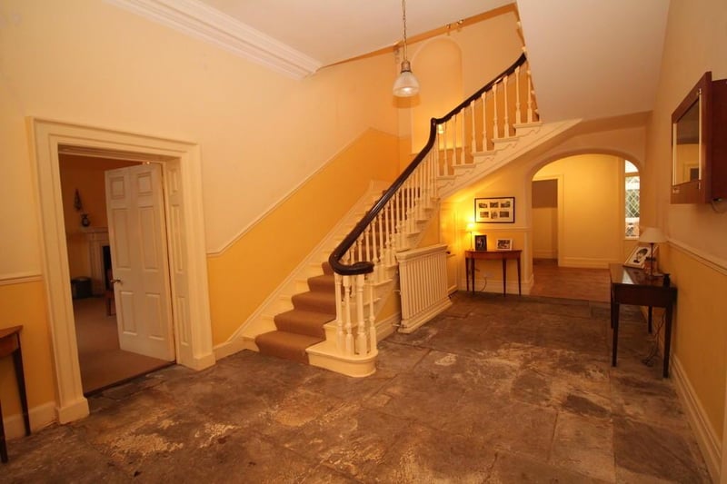 The spectacular staircase leads to a library and two en-suite bedrooms located on the first floor. 

Photo: Rightmove