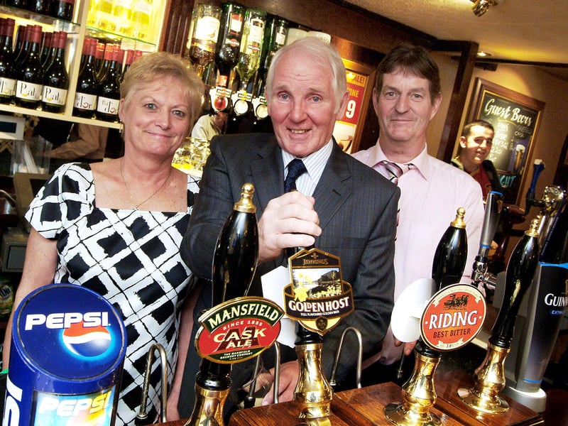 Stags legend Sandy Pate pulls the first pint in the newly-refurbished Ling Forest in Mansfield, watched by landlord and landlady, John and Kath Morritt, in 2010.