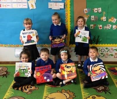 Slybrarians with their books at Windmill Hill Primary School.