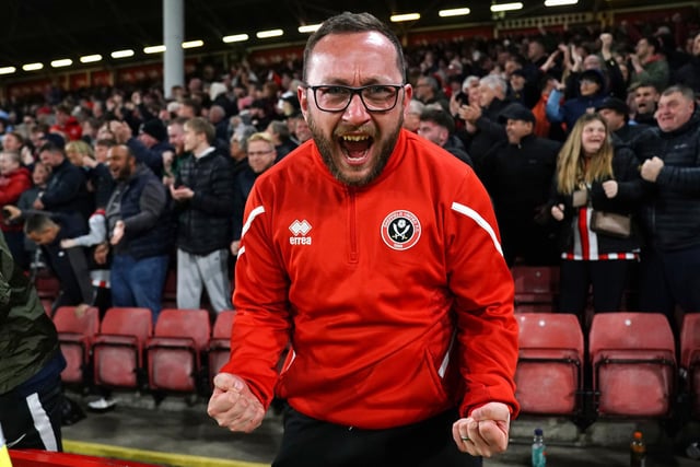 A Sheffield United fan celebrates James McAtee's goal