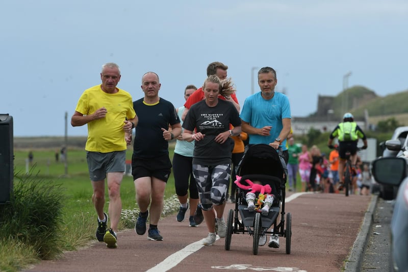 A number of runners took their children around the 5k course in pushchairs.