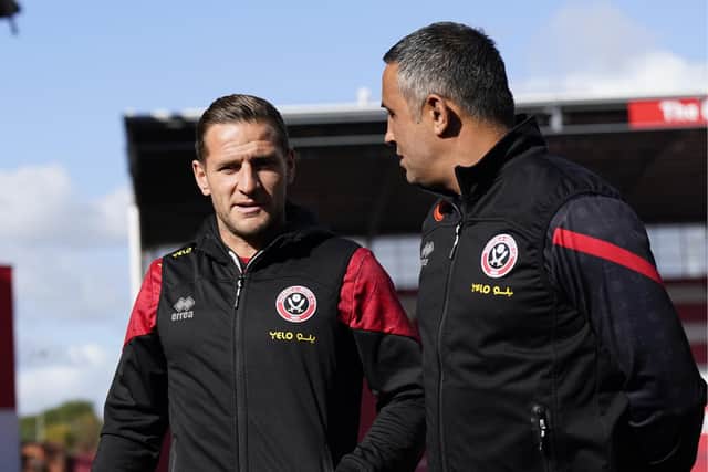 Billy Sharp with Sheffield United's Jack Lester: Andrew Yates / Sportimage