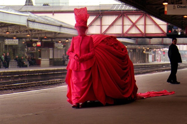 Fran Hegarty wears a huge Victorian dress at Sheffield Midland Station - part of the Site Galllery's Shunted exhibtion in 1998