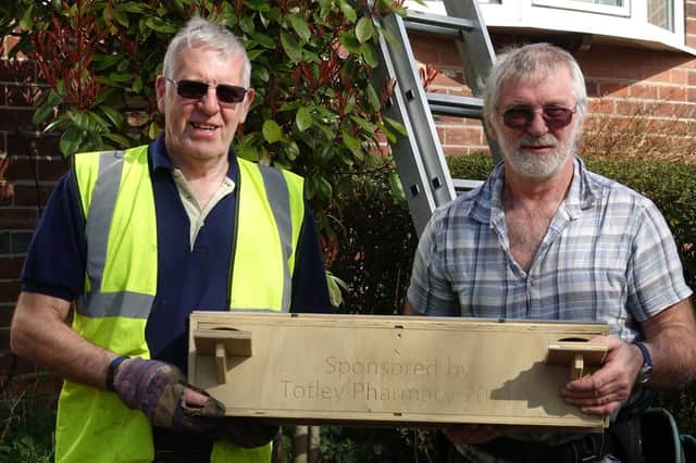 Mick Warwick (left) of Totley Swifts Group and Lester Hartmann (right) of Peak Boxes