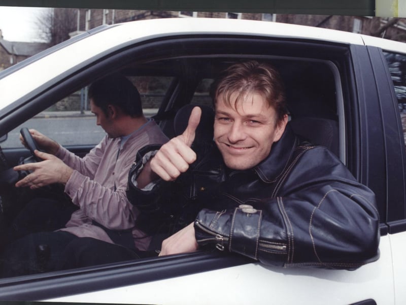 Sean Bean leaves Weston Park by car after being flown there by helicopter from London to continue filming in the city in January 1995