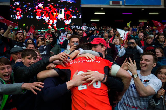 Saracens' Scottish centre Duncan Taylor celebrates with supporters at Murrayfield after the 28-17 win over French side Clermont Auvergne in the 2017 European Champions Cup final. In securing victory, Saracens set a new record of 18 consecutive unbeaten European games.