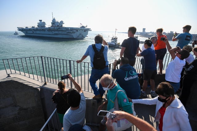Crowds watch on as HMS Queen Elizabeth departs. Picture: Finnbarr Webster/Getty Images