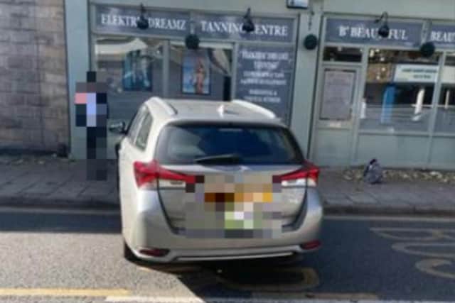 Electric Dreamz Salon, on Howard Road, Walkley, remains open despite a boarded up window where a car crashed into the front of the building. Picture shows the car just after the crash