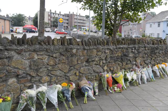 Flowers laid at Royal Navy Avenue in Plymouth to remember the victims of the shootings