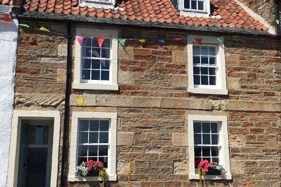 This beautiful three-bedroom former fisherman's cottage, built of stone, is located in the stunning seaside village of St Monans, a short drive from St Andrews - £15,000 total stay.