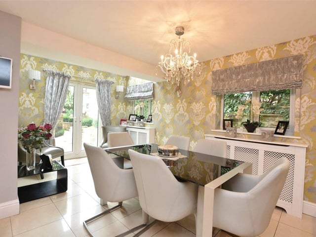 Open access from the kitchen leads to a formal dining area which offers plenty of space for family dining and entertaining, and features double doors leading out to the private courtyard.