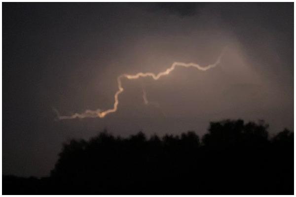 Parts of the UK saw dramatic thunderstorms, with bright flashes of lightning set among a deep, dark backdrop (Photo: Connor/Fwlxr)